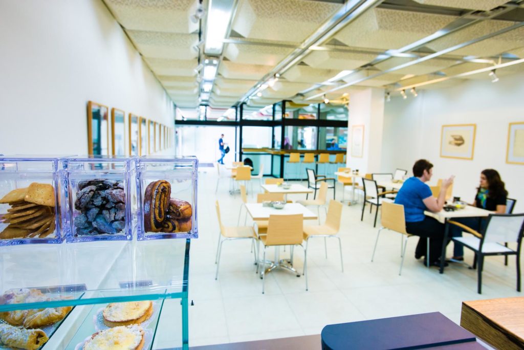 Enjoy coffee and a snack in the new Aroma Café in the lobby of the Zalman Aranne Center Library.