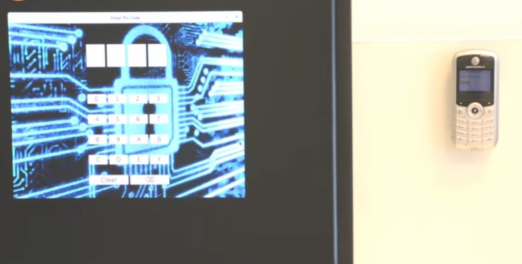 A basic cell phone extracting data from an air-gapped computer.