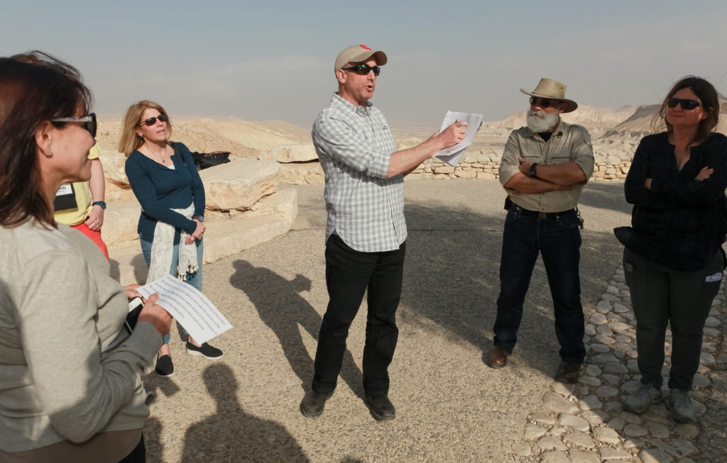 Learning about David Ben-Gurion on the edge of the cliff overlooking the vast and magnificent Zin Valley